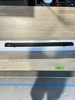 Retail box with sound bar image displayed full length