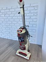 Full view of Shark upright vacuum, handle to base