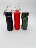 Front view of three Lightway flashlights in black, red and camouflage