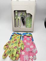 Boxed set showing trowel, cultivator, pruners and two glove packages