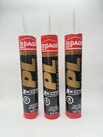 Front view showing three LePage PL Premium cartridges with nozzles attached