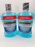 Front view of both bottles showing product name and size