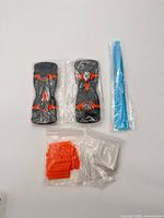 Full kit: two scrapers, blue pry wedge, packs of blades