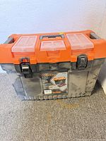 Front view of orange/black Toolway toolbox closed