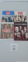 Four Chicago Med DVD season box sets displayed on table, lot tag visible