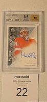 Front of graded card showing player image, autograph, serial number and BGS 8.5/10 label