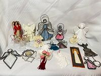Group shot of all angel figurines and ornaments