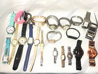 All 22 watches laid out in two rows