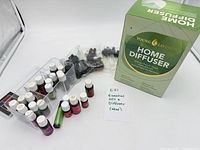 Boxed Young Living Home Diffuser, essential oils, accessories overview