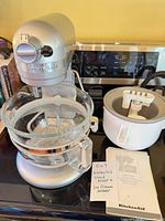 Stand mixer with glass bowl, ice cream maker bowl, manuals