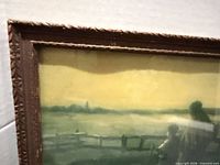 Upper left corner of framed print showing frame detail and glass