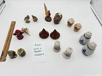 All sixteen shakers laid out