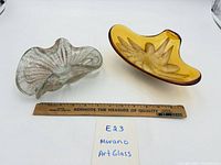 Both Murano dishes with ruler for scale