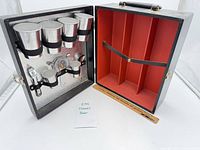 travel bar case open showing cups, tools, interior compartments