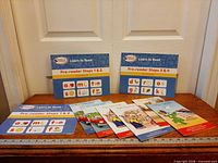 Overall view showing two workbooks and six storybooks