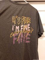 Back view showing full multicolour text graphic