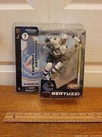 Front view of sealed Todd Bertuzzi figure in packaging