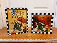 Both hardcover editions side by side on table