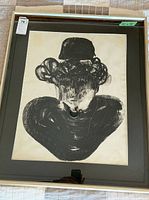 Full view of framed artwork showing frame, mat, portrait