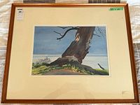 Framed painting with mat and wooden frame showing overall presentation and label 35 x 28 in