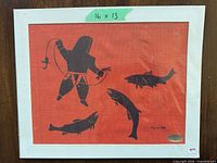 Full view of matted Inuit art print on red background