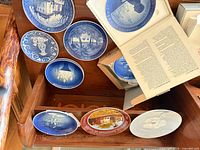 Drawer with multiple blue and coloured collector plates