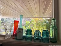 Full lot on windowsill showing all seven glass pieces