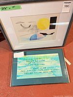 Both framed artworks side by side