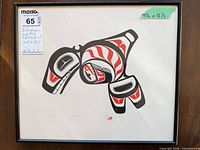 Full view of framed serigraph showing image, frame and size tag