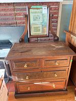 Full view dresser with attached mirror