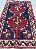 Full view of rug showing design and colors