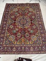 Full view of Tabriz rug showing entire design