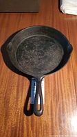 Top view of Findlay No. 8 cast iron skillet showing cooking surface and handle