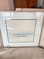 Front view of framed watercolor showing image, mat, and frame