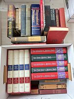 Overall view of box showing Chambers Dictionary, Folio Society sets and additional vintage hardcovers