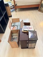 Overall view of boxes of CDs, cassette tapes and CD tower