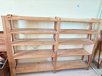 Front view of both shelving units showing structure and shelves