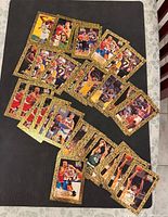Spread of Fleer Ultra gold-pattern basketball cards showing fronts and condition