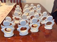 Front view of group showing quantity and design of angel napkin rings