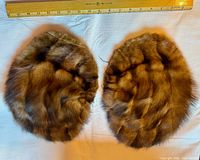 Top view of both fur panels showing fur side with ruler for scale