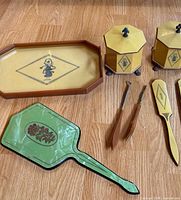 Complete 7-piece Lucite dresser set displayed