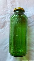 Full view of green glass bottle front
