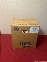 Whole egg carton box containing items