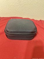 Exterior of black zippered carry case