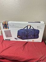 Factory box showing Skyway Whidbey 30" rolling duffel