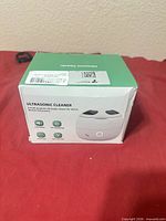 Front and top of retail box showing product image and text