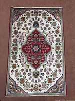 Full view of rug showing complete design and condition