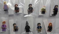Group shot of all ten bagged minifigures showing overall contents