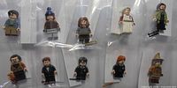 Group shot of all ten individually bagged minifigures in two rows