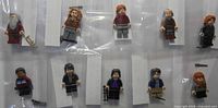 All ten minifigures arranged in two rows with accessories visible